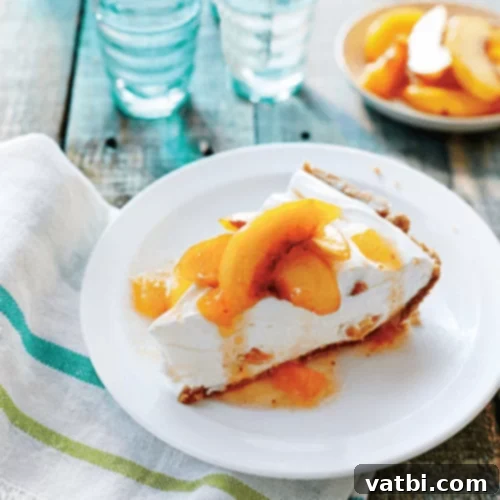 Bake-Free Bliss: 69 Easy Pie Recipes 15 A slice of No Bake Peach Pie topped with fresh peaches.
