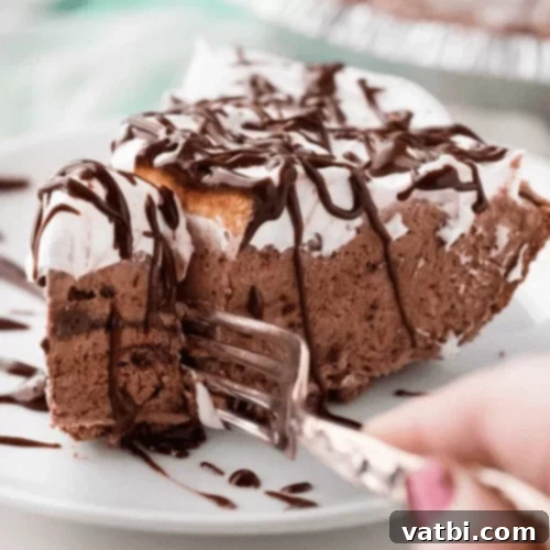 Bake-Free Bliss: 69 Easy Pie Recipes 41 A slice of No Bake Chocolate Icebox Pie with layers of chocolate.