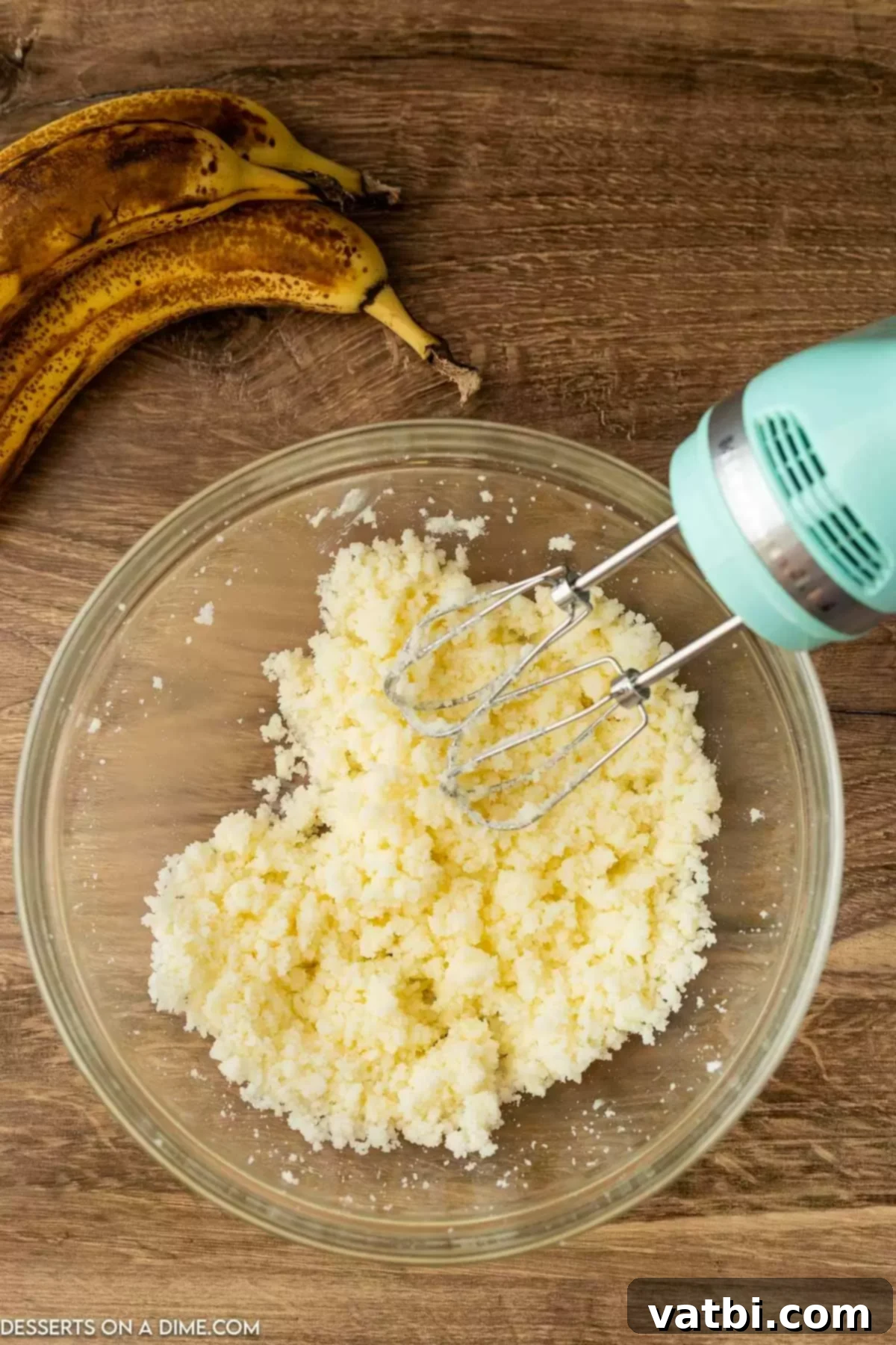 Fudgy Banana Bread Brownies 4 Mixing bowl with softened butter and granulated sugar, being creamed together.