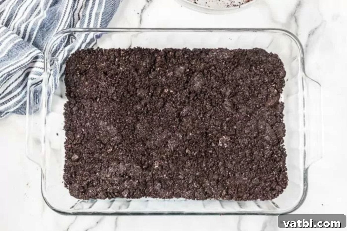 Decadent No-Bake Oreo Lasagna 3 Oreo cookie crumbs pressed into a baking dish