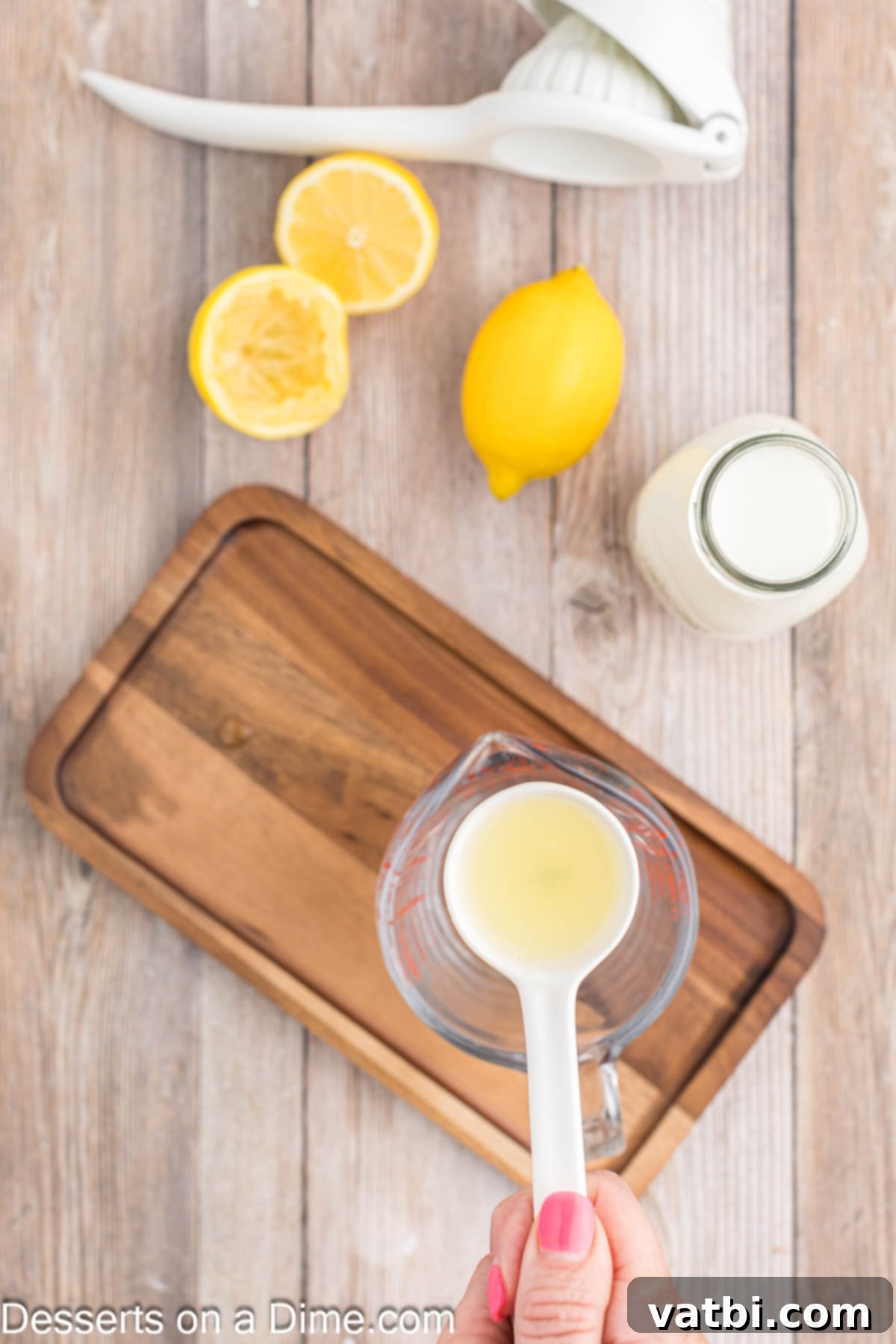Buttermilk Demystified 4 Lemon juice poured into measuring cup.