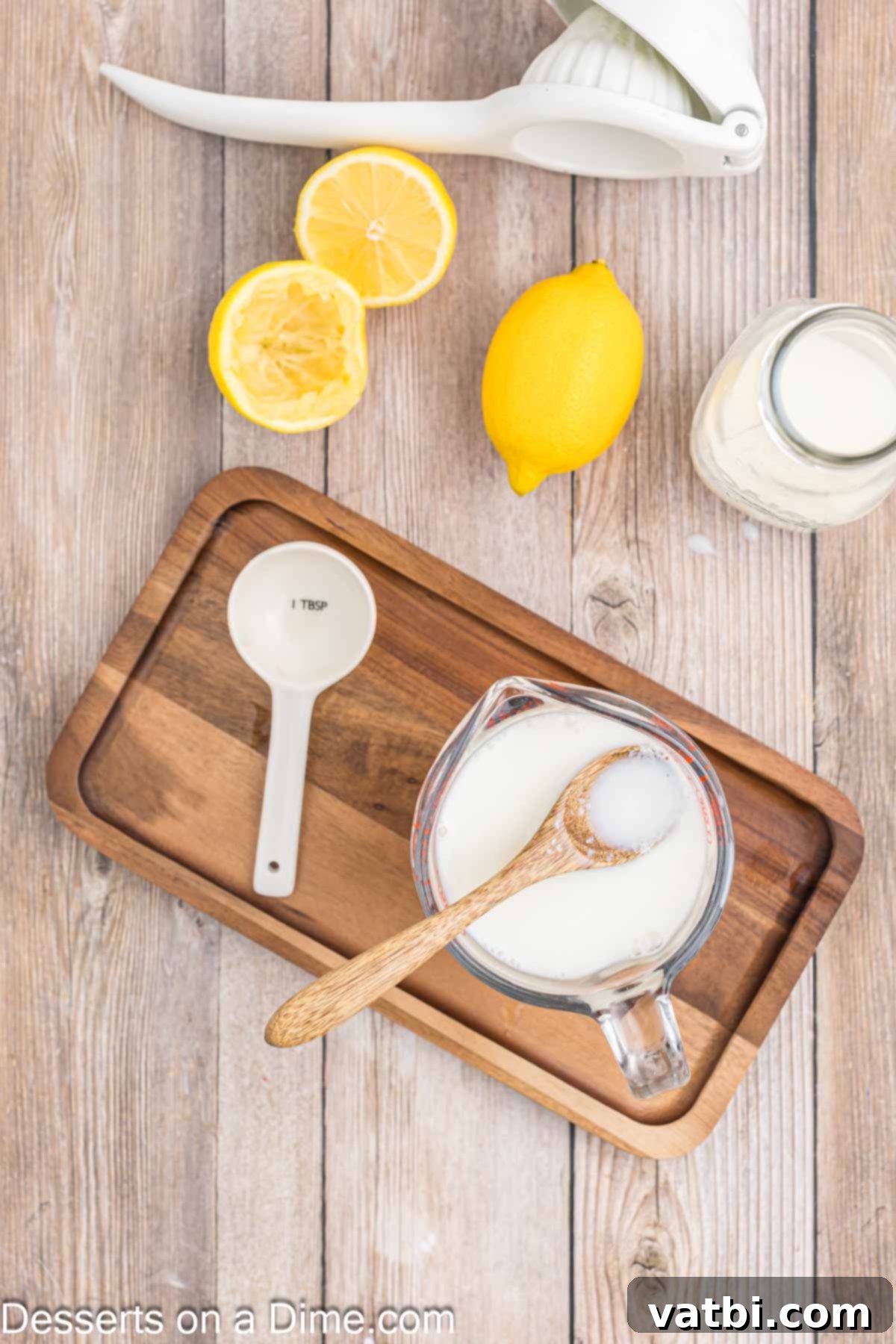 Buttermilk Demystified 6 Milk stirred together in a measuring cup.