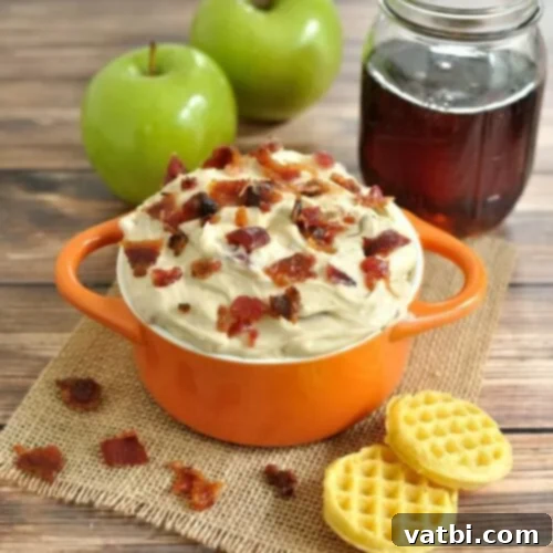 Creamy Bacon Dip with Maple Syrup, garnished with crumbled bacon.