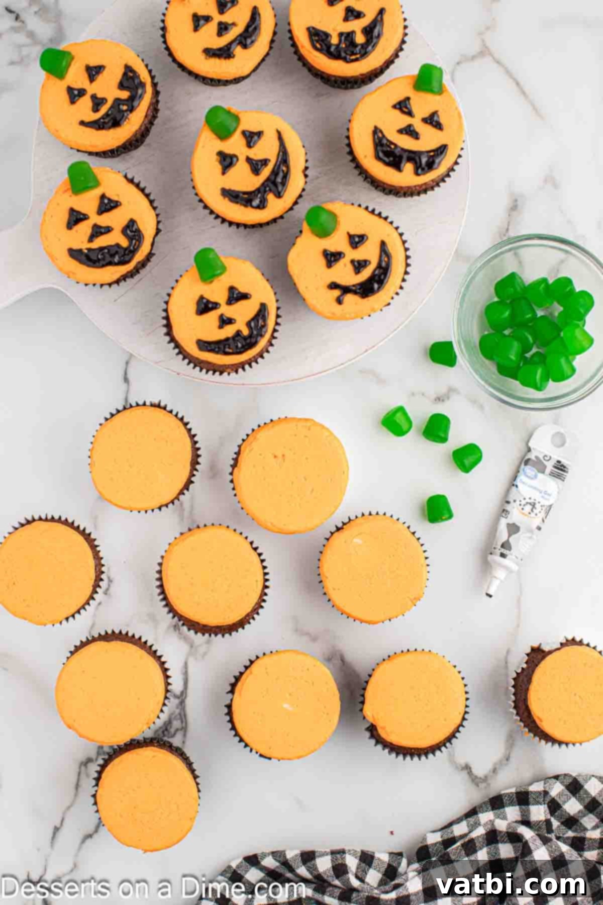 Carved Pumpkin Cupcakes 8 Orange frosting generously spread on each cooled chocolate cupcake.
