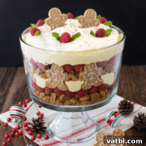 53 Holiday Eggnog Delights 19 No bake eggnog cheesecake trifle with layers of pudding, cookies, and berries.