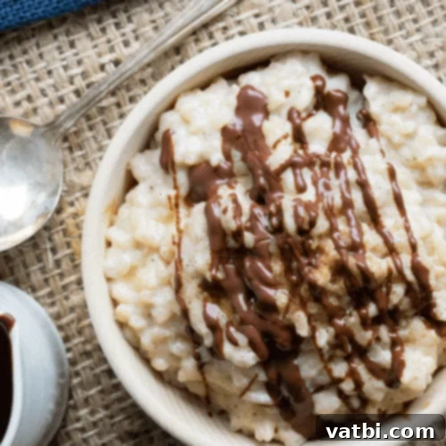 53 Holiday Eggnog Delights 53 Eggnog rice pudding, a comforting treat for Christmas breakfast.