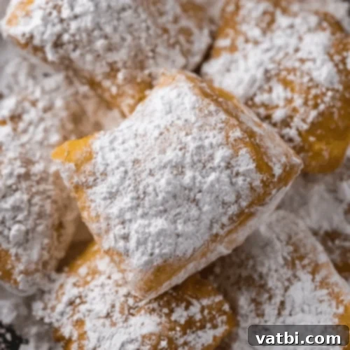 Irresistible Donut Ideas 11 New Orleans style beignets dusted with powdered sugar.