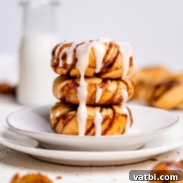 Irresistible Donut Ideas 21 Cinnamon Roll Donuts with cream cheese icing.