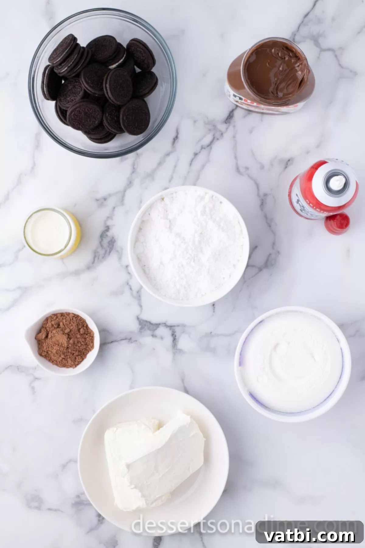 Decadent No Bake Nutella Cheesecake 3 Ingredients for cheesecake - oreo cookies, butter, cream cheese, nutella, cocoa powder, powdered sugar, whipped topping.