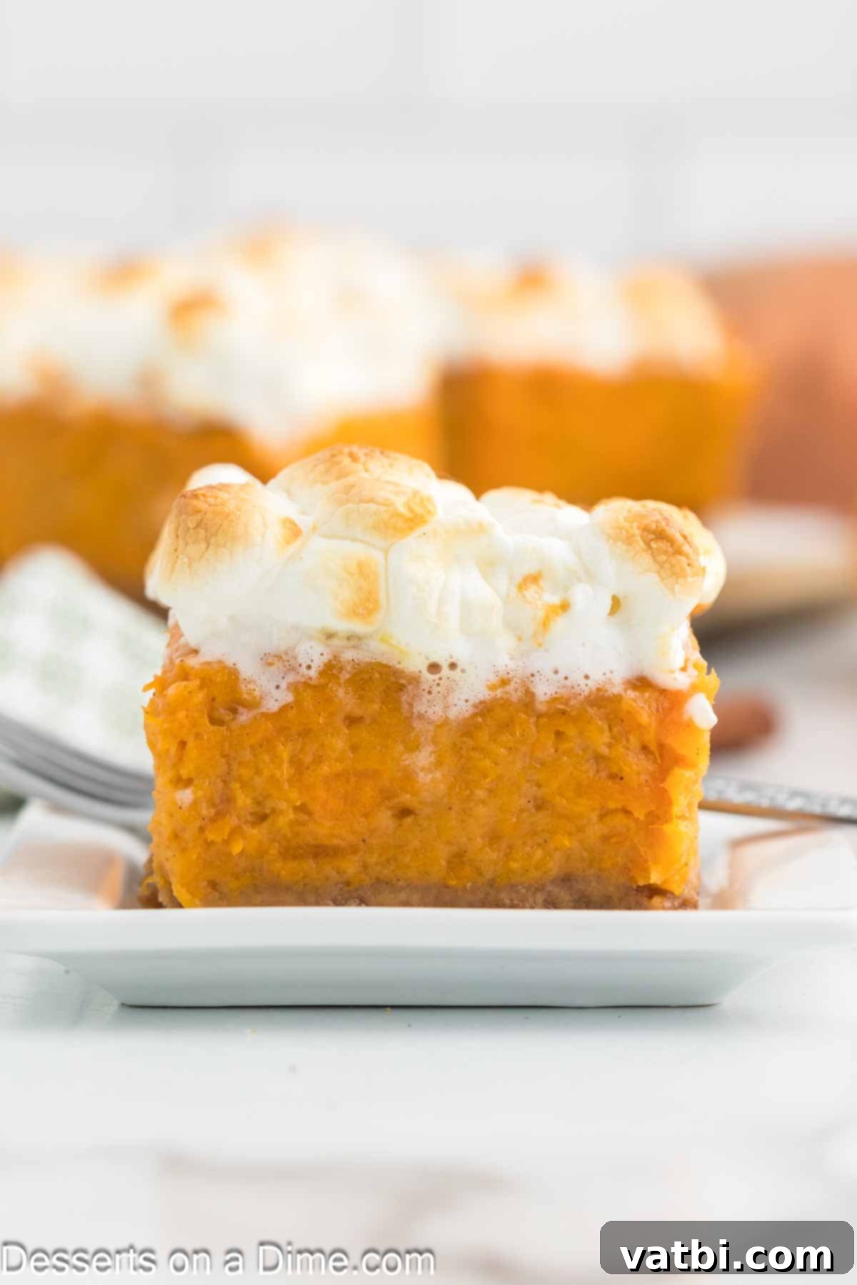Perfectly sliced Sweet Potato Pie Bars arranged for serving, showing the distinct layers.