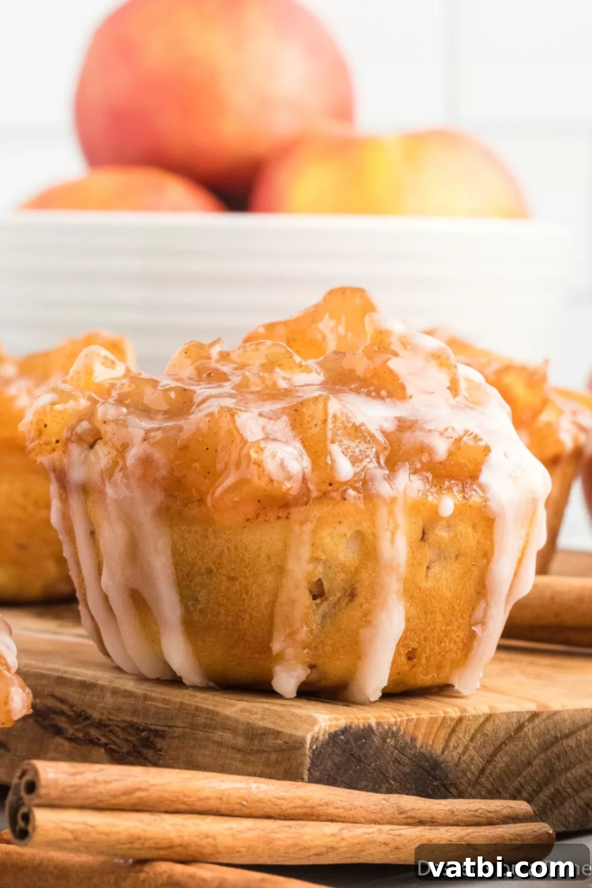 Cinnamon Roll Apple Pie Cups 2 Cinnamon Roll Apple Pie Cups on a white plate