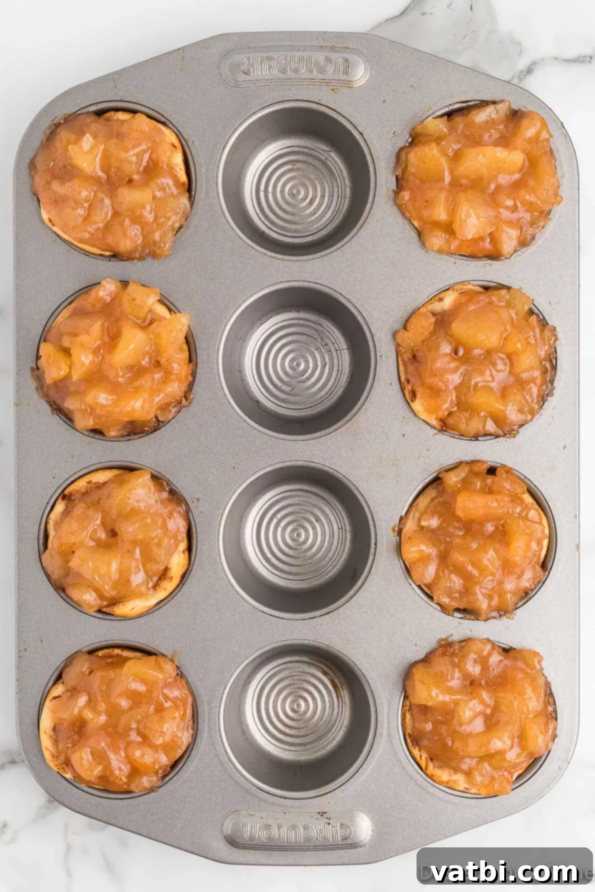 Cinnamon Roll Apple Pie Cups 8 Apple pie filling in cups.