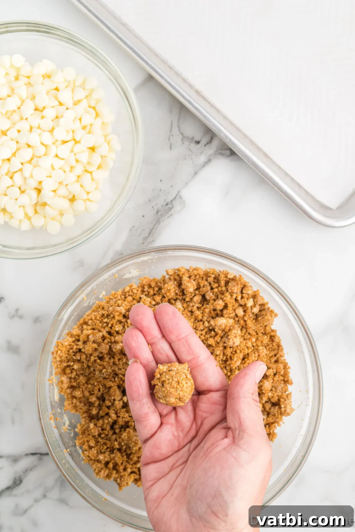 Pumpkin Spice Truffles 7 Graham cracker crumb mixture rolled into a perfect ball in hand, ready for chilling.