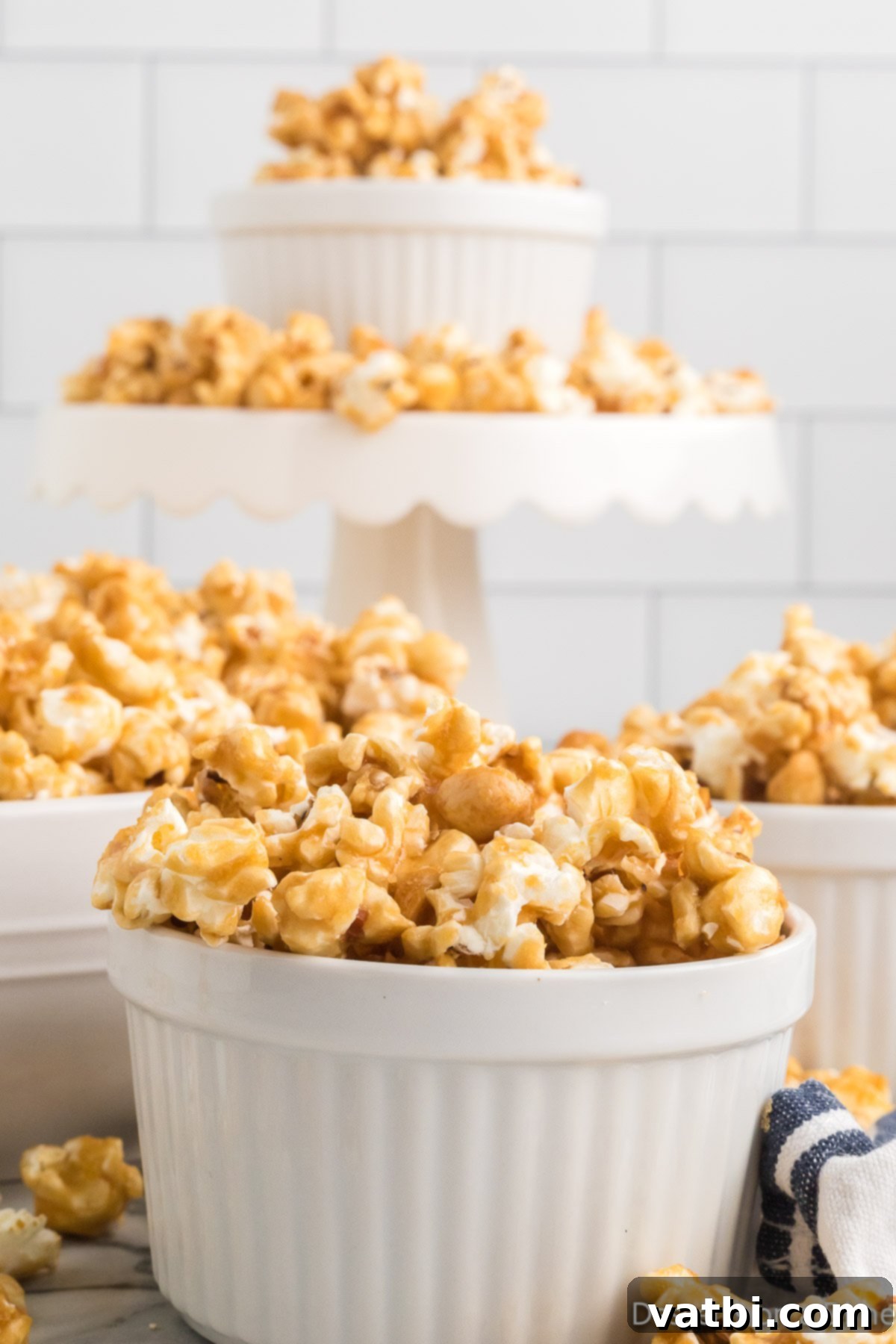 Buttery Toffee Bliss Popcorn 12 Close-up of crunchy butter toffee popcorn in a serving bowl, showcasing its golden coating.
