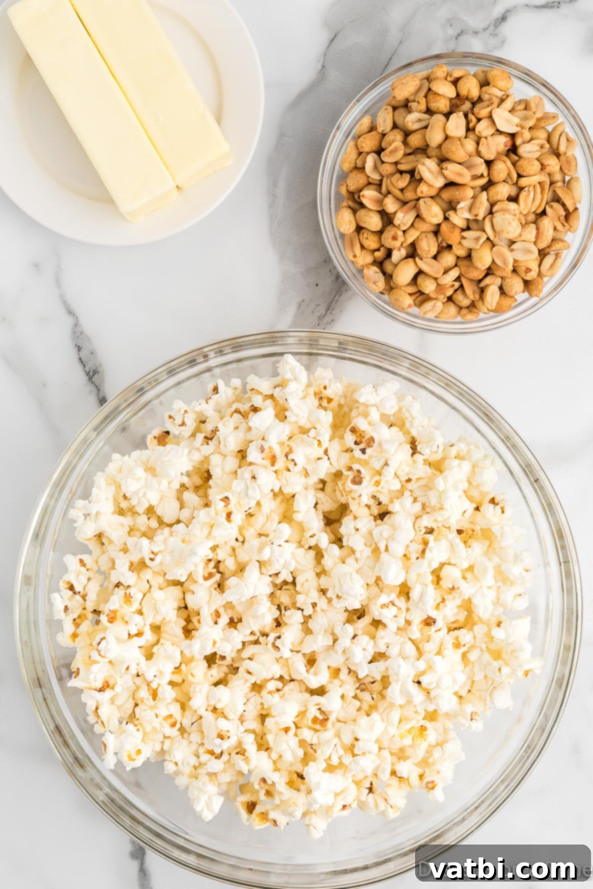 Buttery Toffee Bliss Popcorn 4 Popped popcorn in a large metal bowl, ready for the next step.