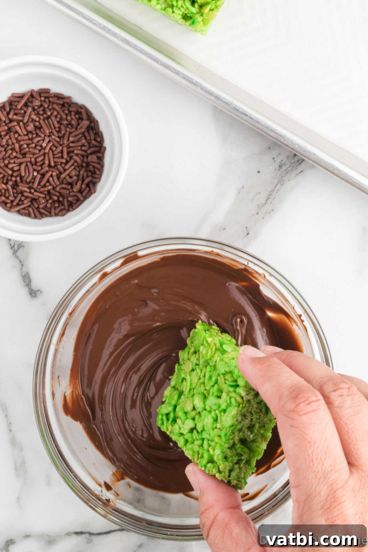 Rice krispie treats dipped into chocolate. 