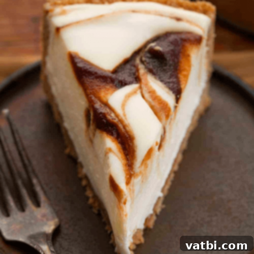 Apple Butter Cheesecake with an apple butter swirl.