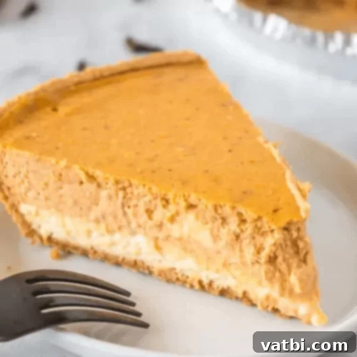 Classic Pumpkin Cheesecake with a smooth, spiced filling.