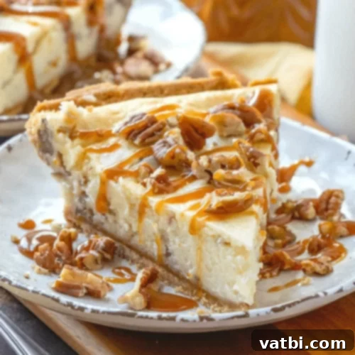 Butter Pecan Cheesecake with a swirl design on top.