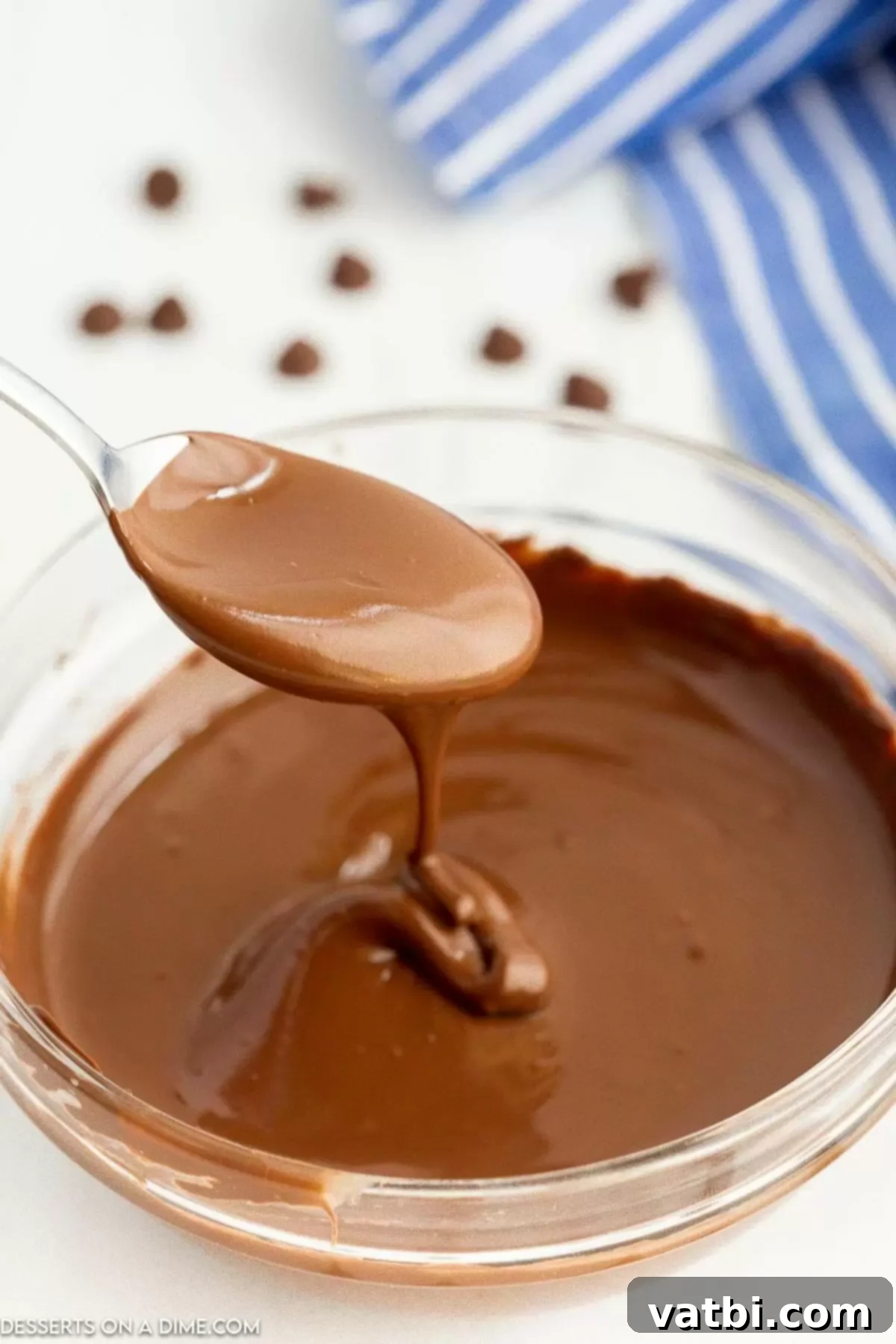 Melt Chocolate Chips Perfectly Every Time 6 Perfectly melted chocolate in a clear bowl, ready to be thinned or used in recipes.