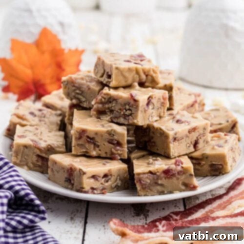 55 Festive & Easy Christmas Fudge Ideas 15 Maple Bacon Fudge squares, topped with crispy bacon bits.