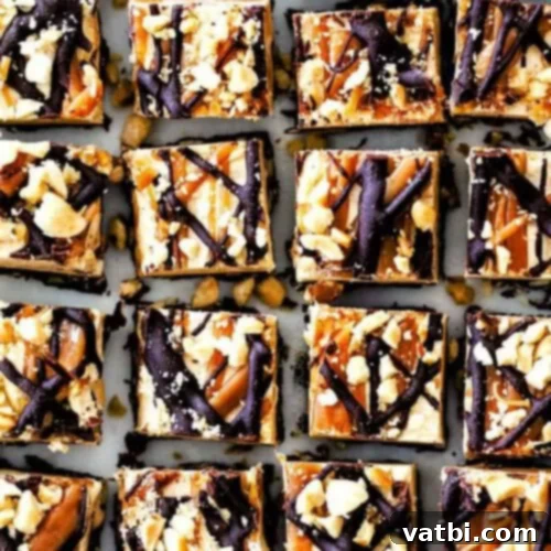 55 Festive & Easy Christmas Fudge Ideas 18 Chocolate Caramel Peanut Butter Fudge slices with layers.