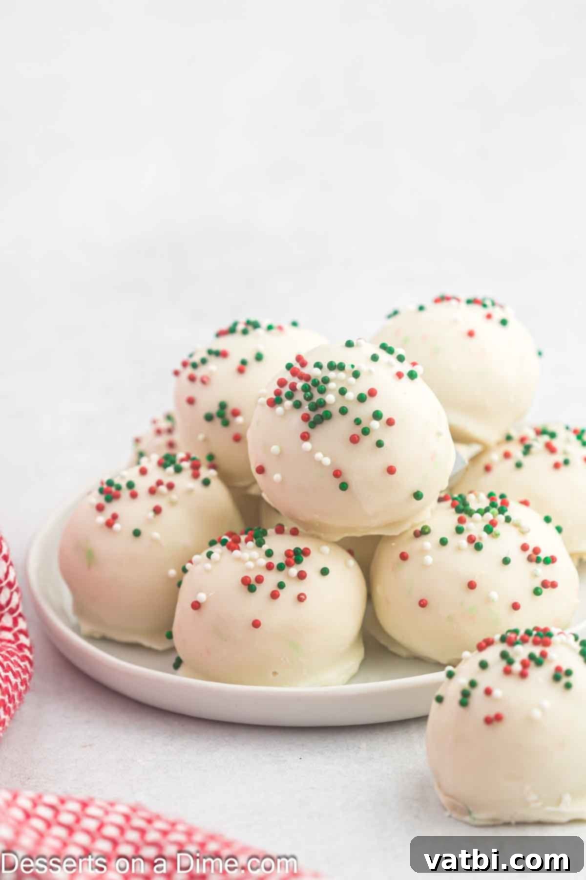 sugar cookie truffles on a cake platter 