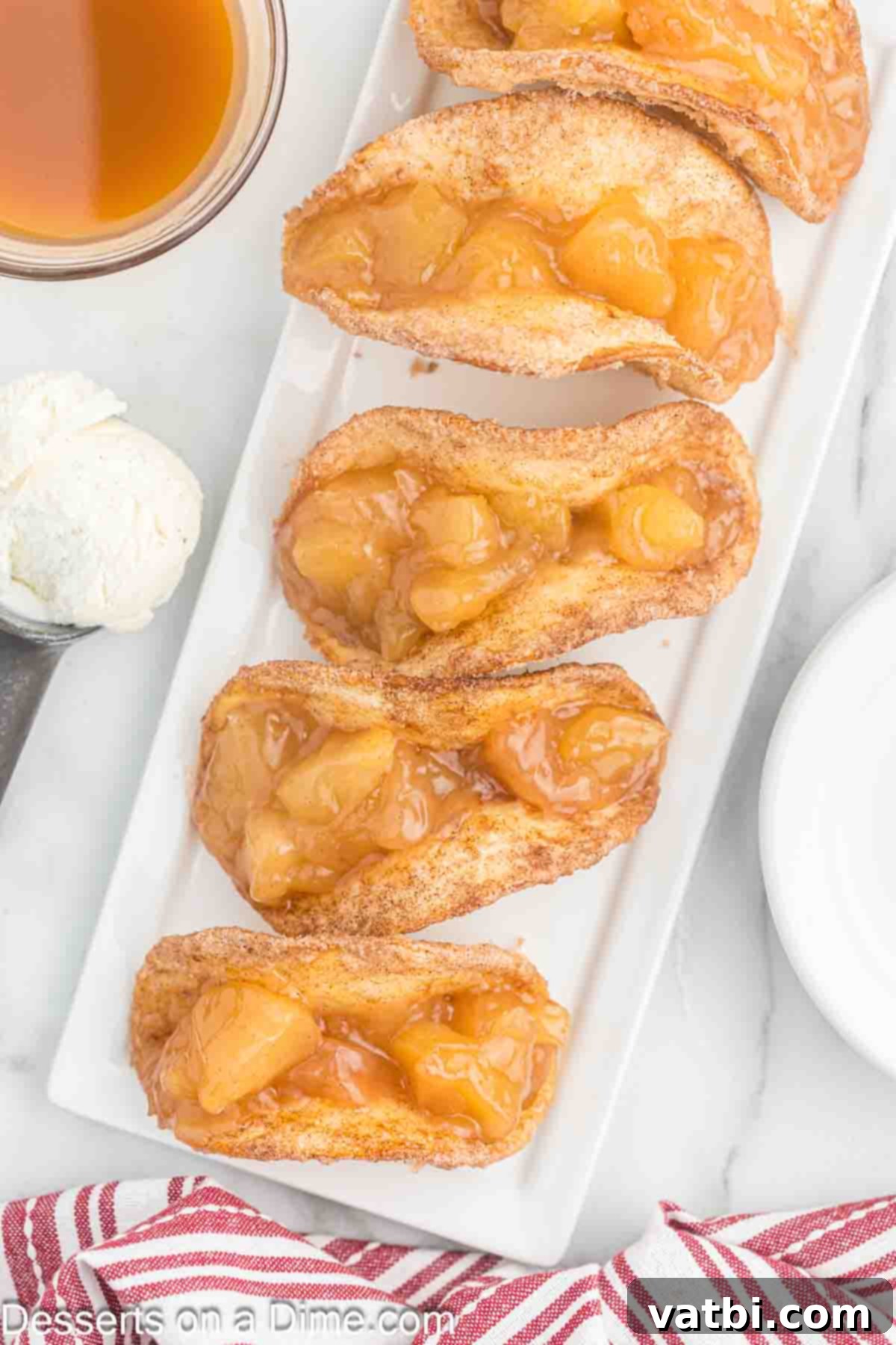 Crispy Apple Pie Wraps 9 Apple Tacos on serving platter.