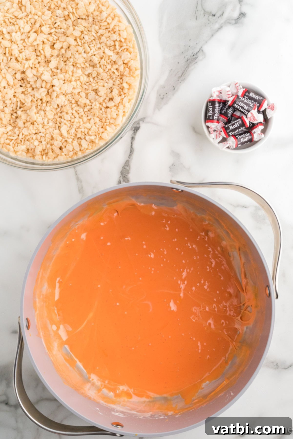Autumn Rice Krispie Pumpkin Treats 9 Mixture combined until orange.