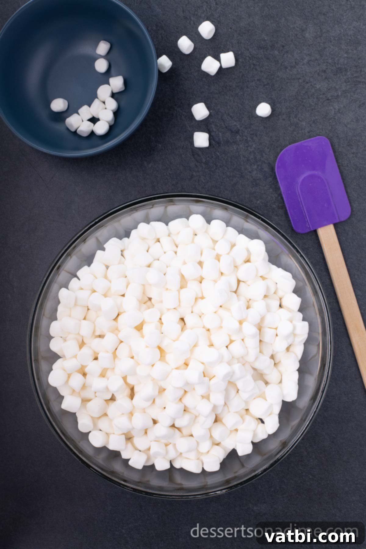Monster Mash Krispie Treats 3 Step 2: Stir marshmallows into melted butter for Rice Krispie treats.