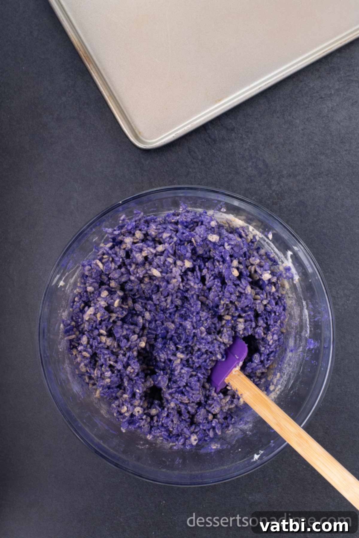 Monster Mash Krispie Treats 5 Step 4: Mix Rice Krispies cereal into the colored marshmallow mixture.