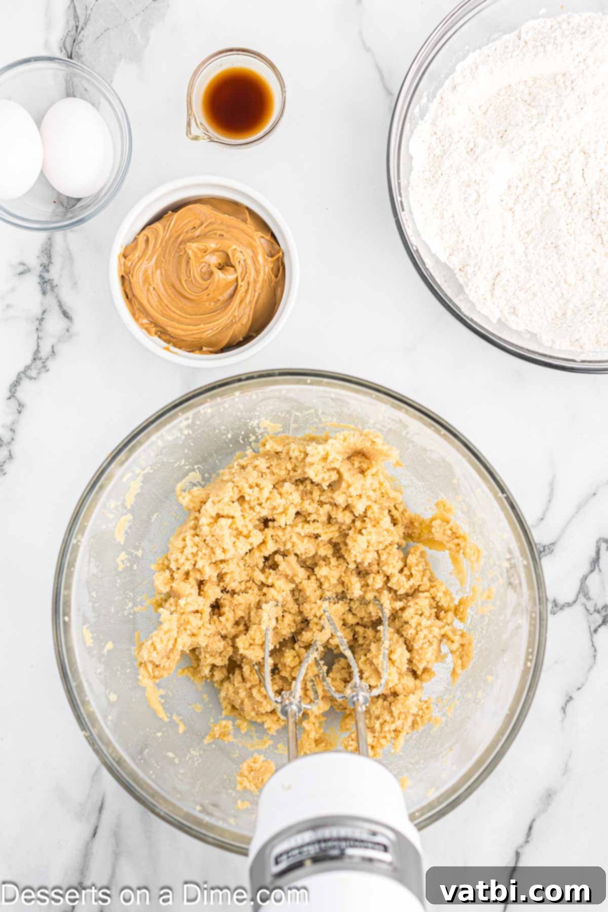 Delightfully Easy Halloween Spider Treats 5 Butter and sugar combined in a bowl for the cookie dough.