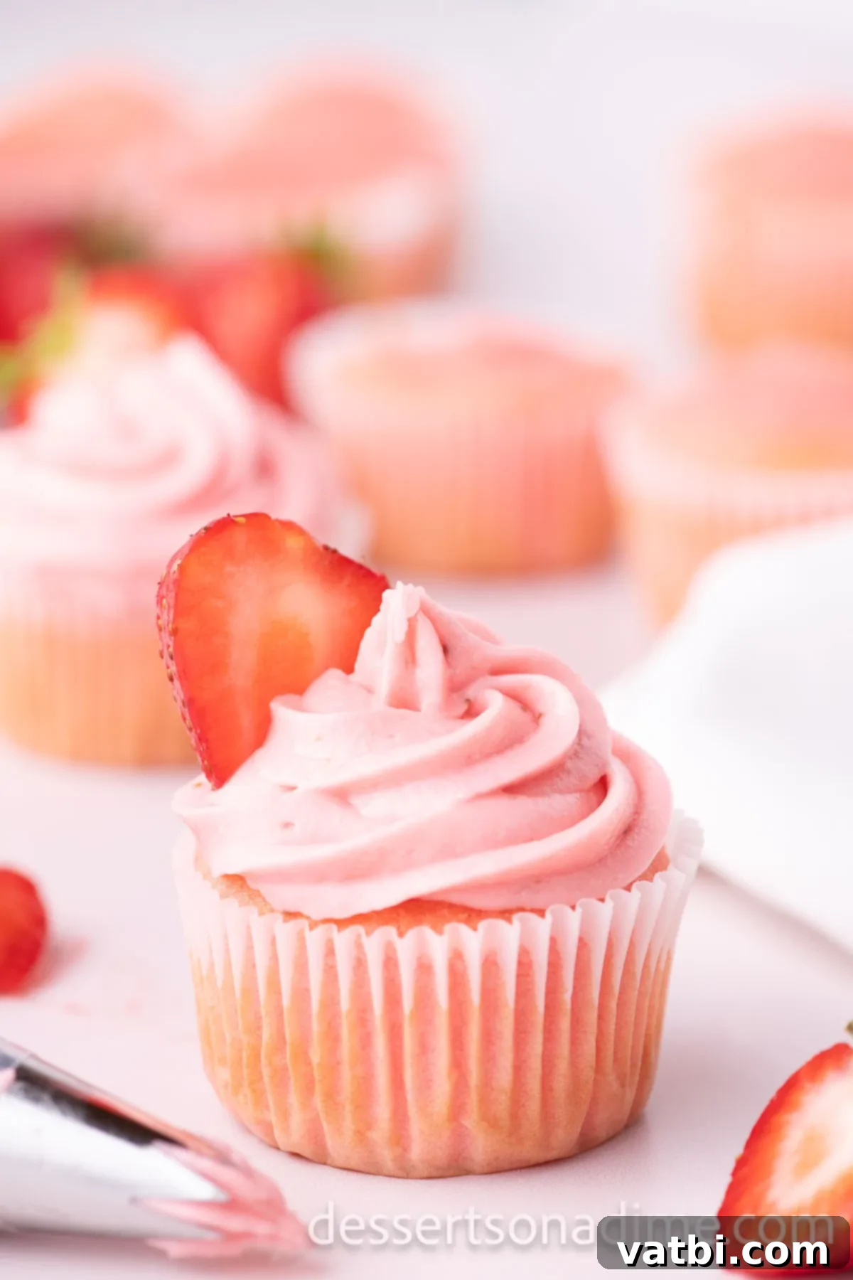 Luscious Strawberry Cream Cheese Dream 2 Strawberry Cream Cheese Frosting on a cupcake.