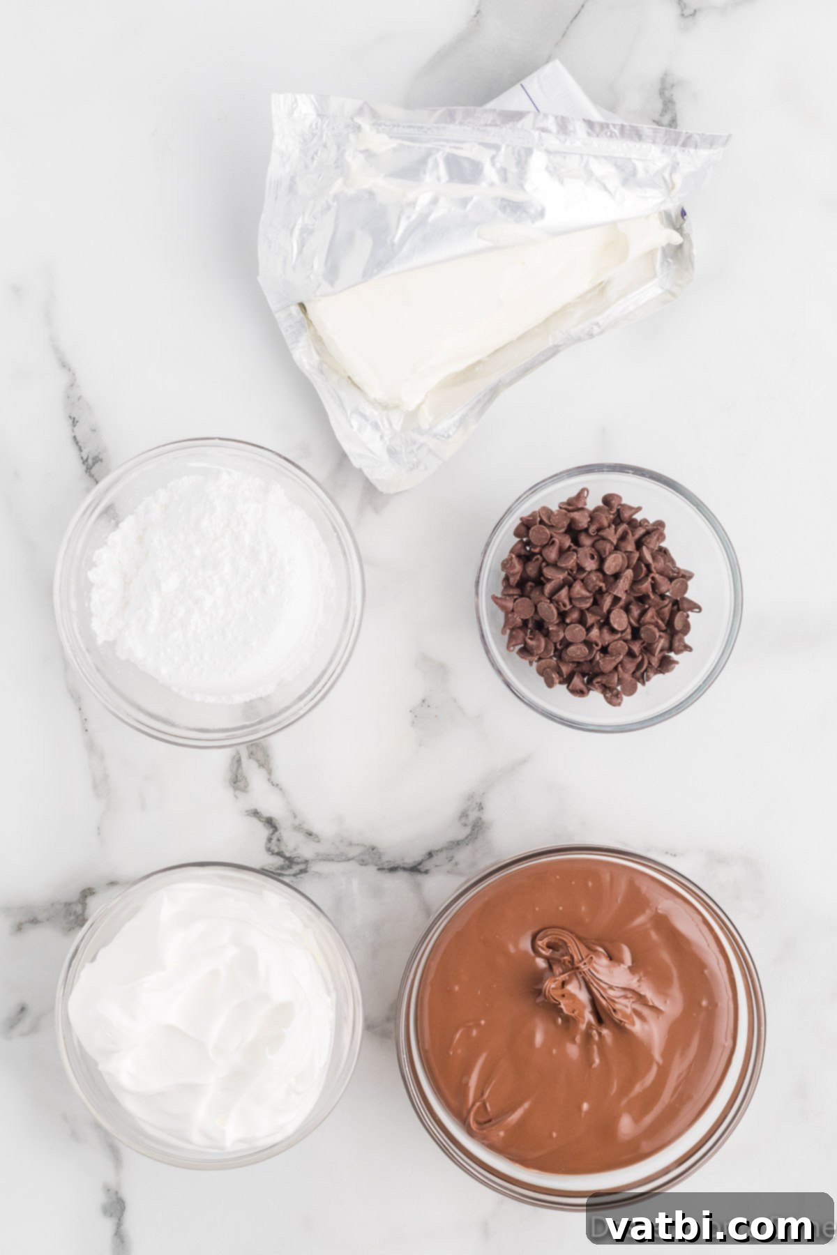 Nutella Fondue 3 Ingredients for dip - Nutella, powdered sugar, cool whip, cream cheese, chocolate chips