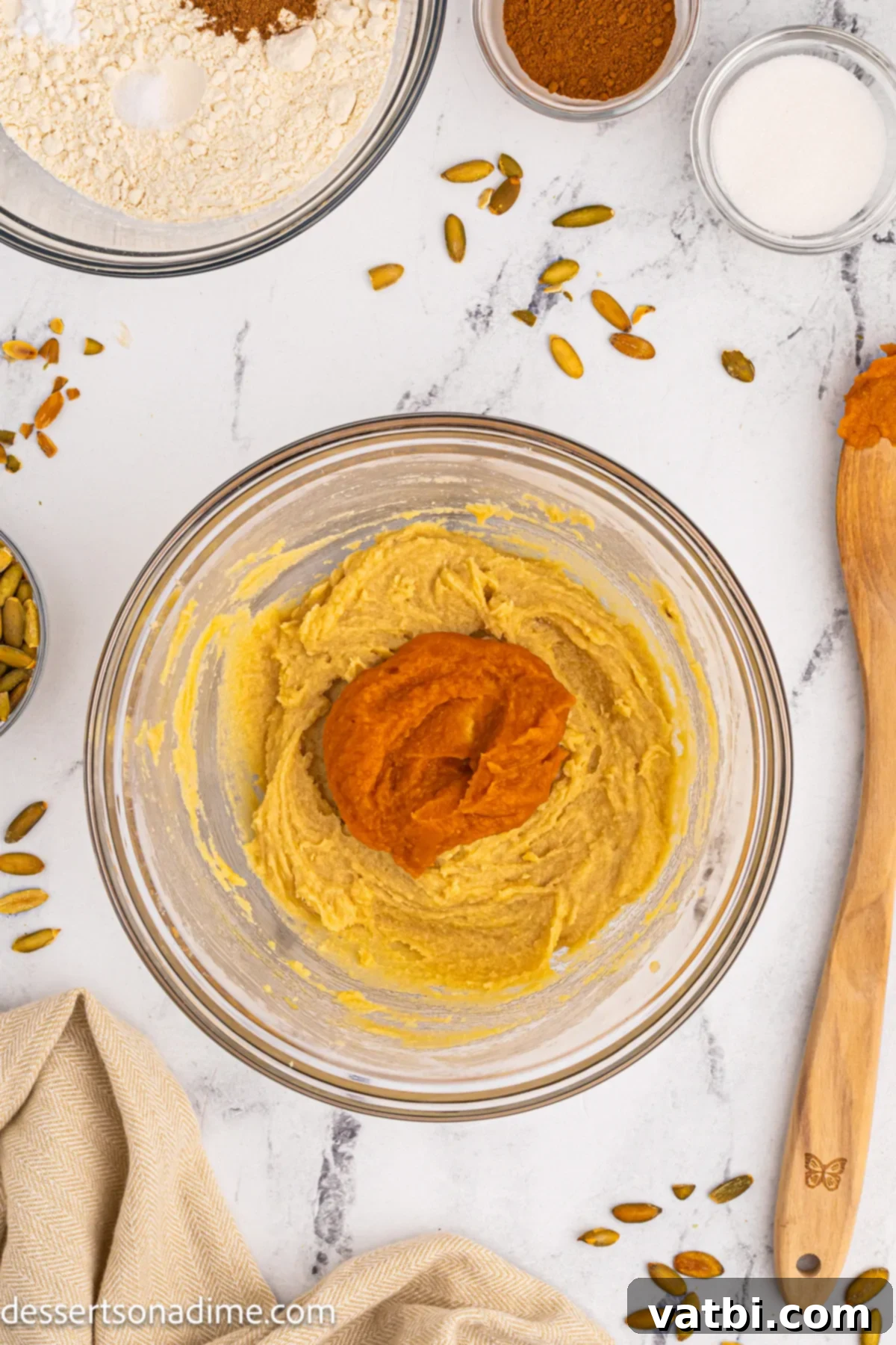 Autumn Spice Pumpkin Snickerdoodles 5 Pumpkin puree added to the creamed butter and sugar mixture.
