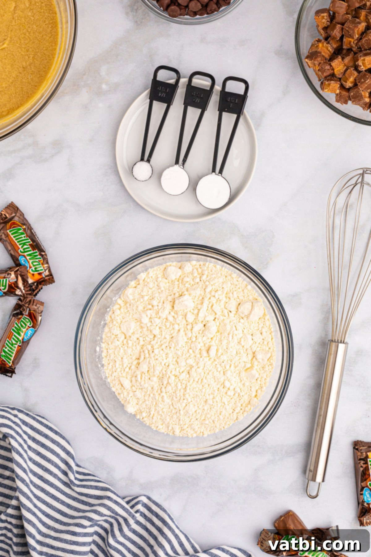 Separate bowl with all-purpose flour, baking soda, and salt mixed together.