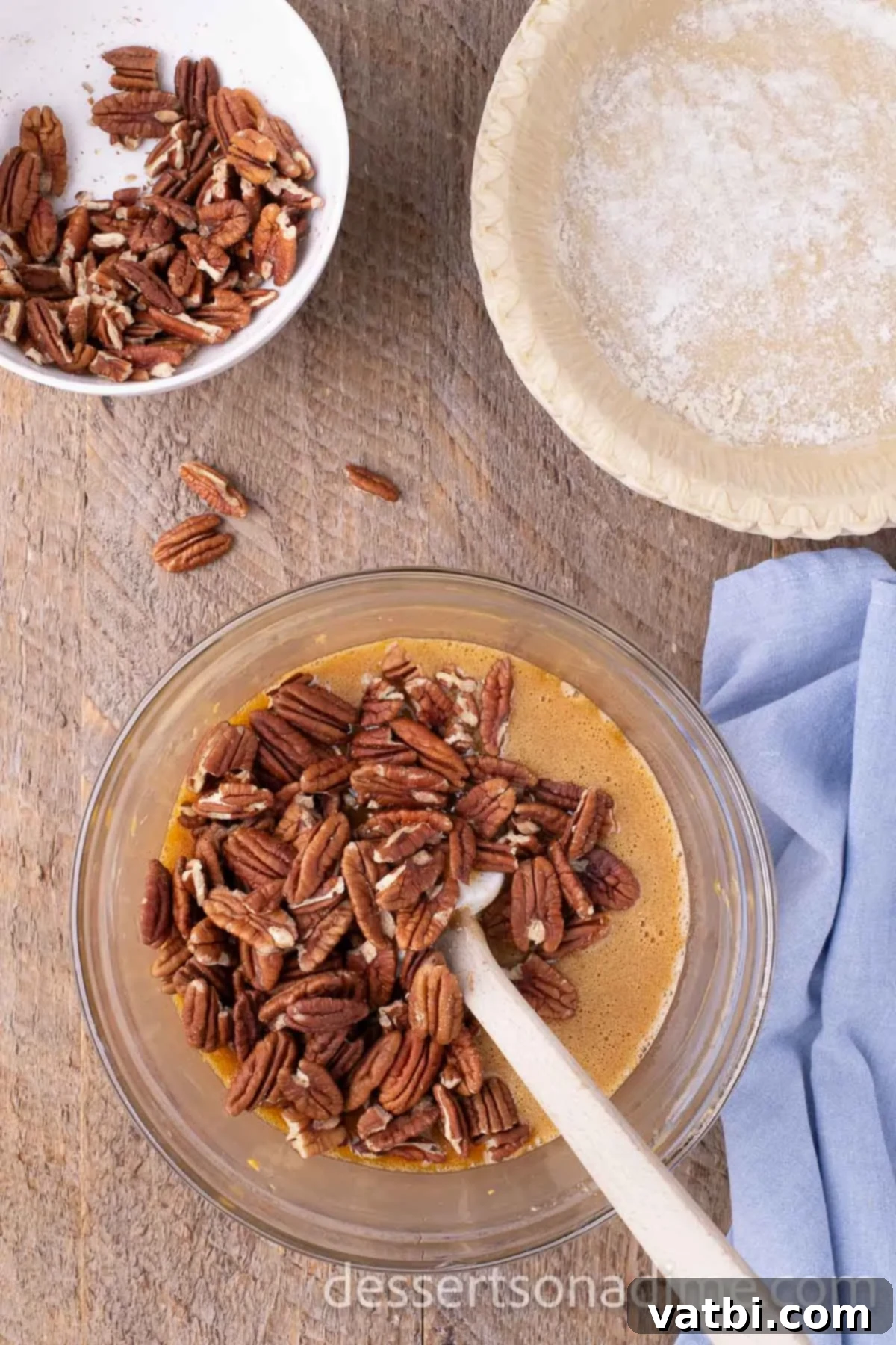 Mixing in pecans in the butterscotch mixture