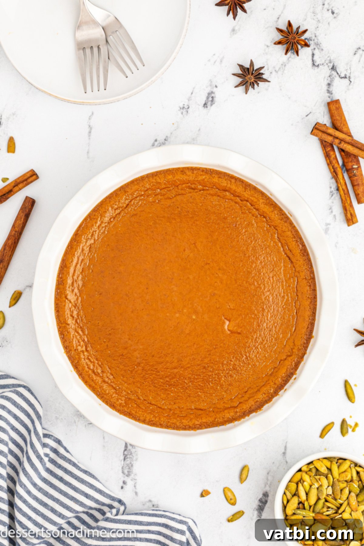 Velvet Pumpkin Pudding Pie 8 Crustless pumpkin pie baking in the oven.