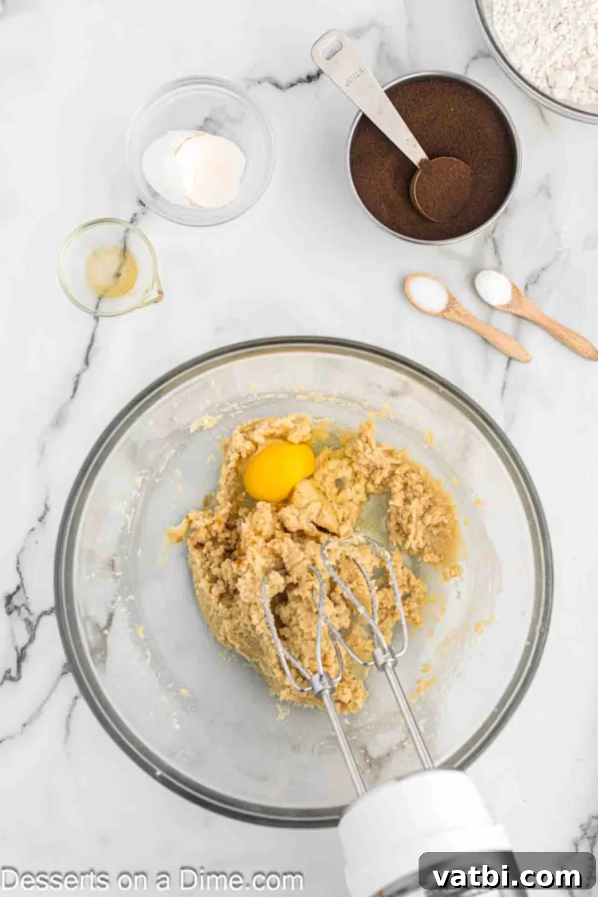 Espresso Cookies 5 Egg and vanilla extract mixed into the creamy butter and sugar batter.
