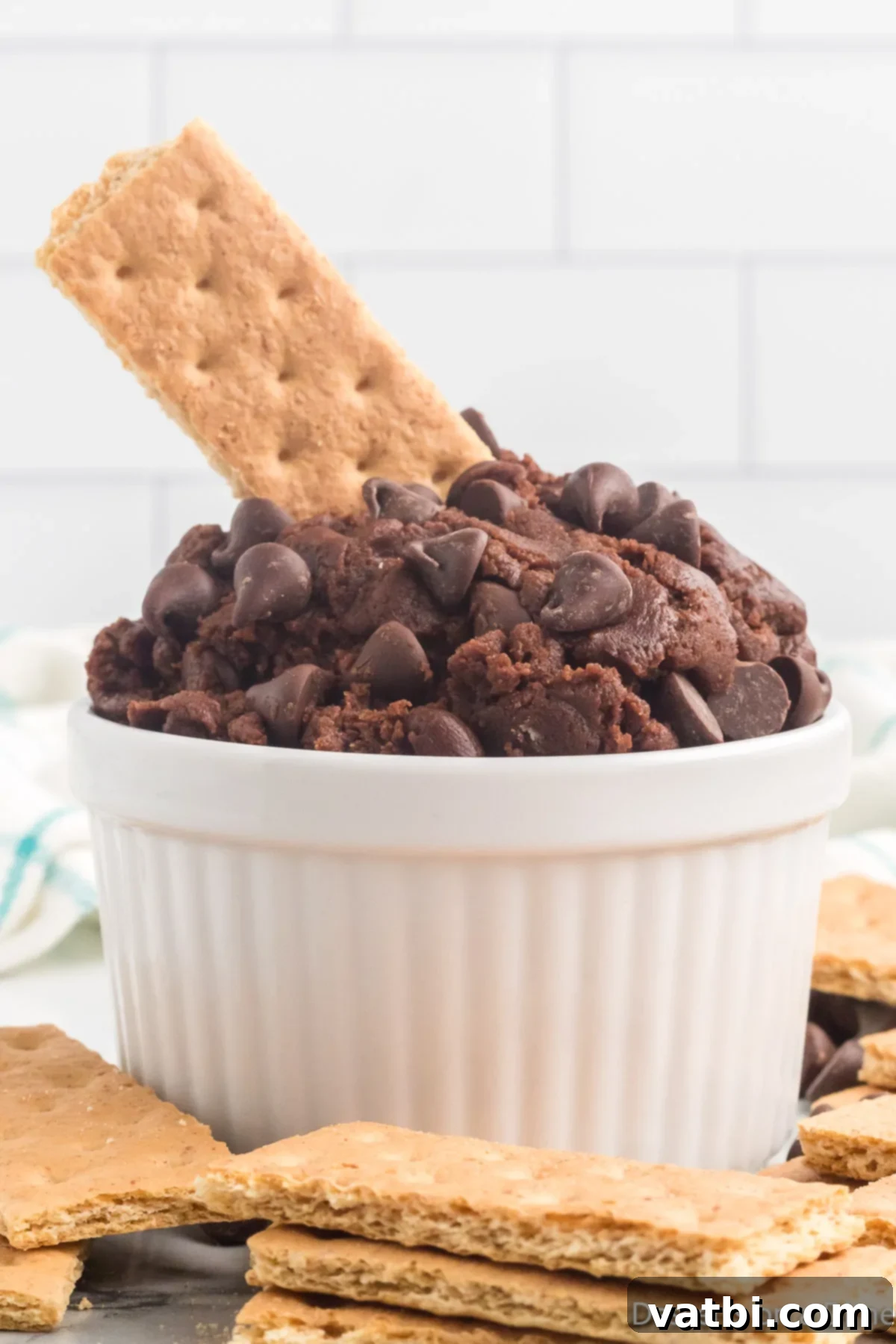 Spoonable Brownie Bliss 2 Bowl of edible brownie batter with graham crackers, ready to serve
