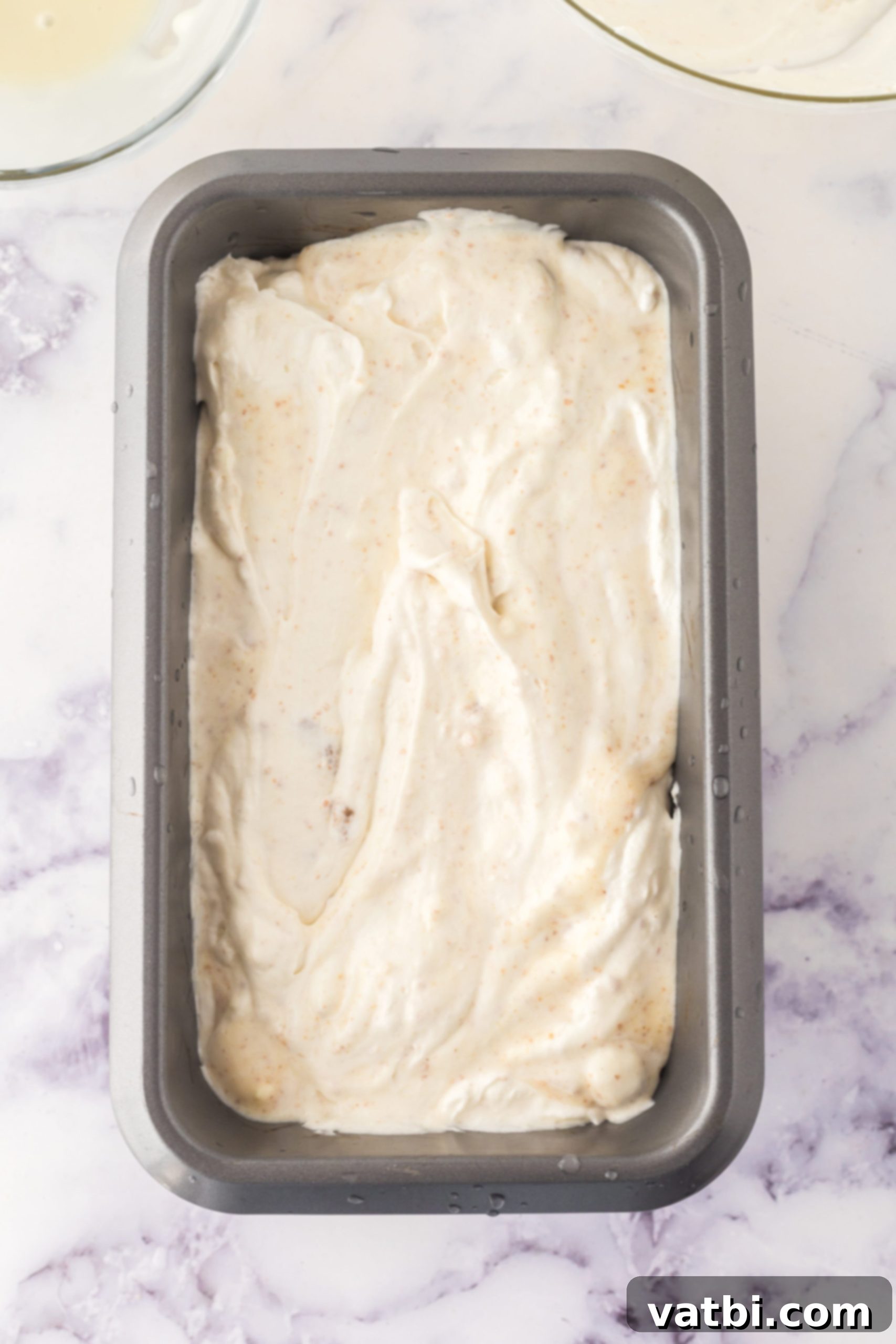 Easy No-Churn Cheesecake Ice Cream 6 Mixture in loaf pan.
