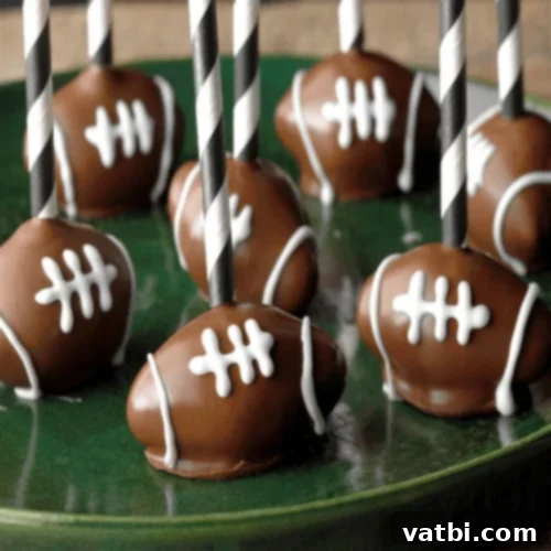 Creative Football Cake Inspiration 13 Football cake pops with chocolate centers and peanut butter coating.