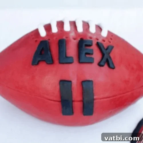 Creative Football Cake Inspiration 18 AFL Football Birthday Cake with buttercream and fondant decorations.