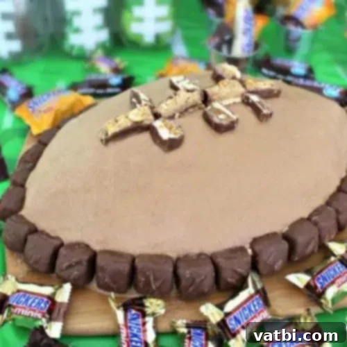 Creative Football Cake Inspiration 26 Football shaped cake with Snickers, a rich and easy dessert.