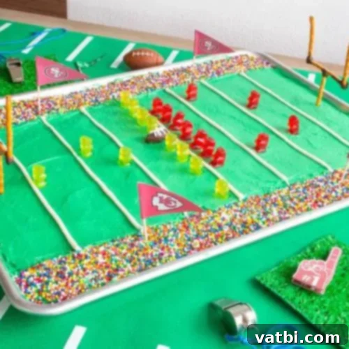 Creative Football Cake Inspiration 28 Sheet Pan Football Stadium Cake, decorated with green field and white lines.