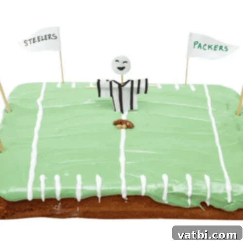 Creative Football Cake Inspiration 3 Football field cake with green frosting and goalposts, ready for a game day celebration.
