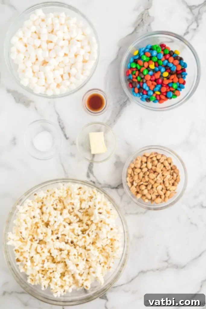 Homemade Popcorn Delight Bars 3 Bowls of ingredients for popcorn bars including freshly popped popcorn, mini marshmallows, salted peanuts, and M&M's, ready for mixing.