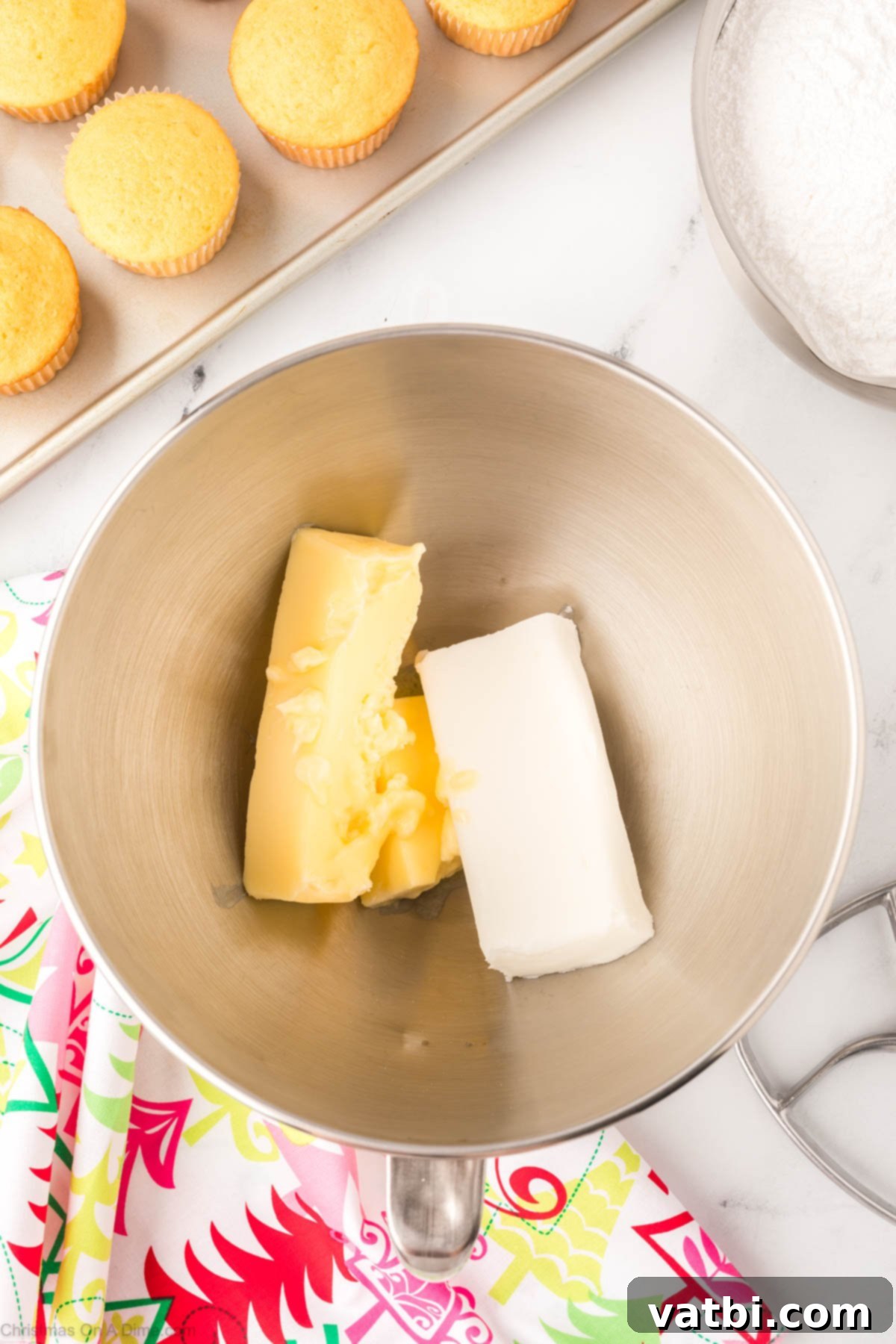 Softened butter and vegetable shortening in a stand mixer bowl, ready to be whipped for frosting.