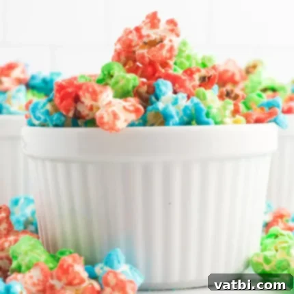 Festive Candy Treats 14 Candy Popcorn, a colorful sweet treat with a tasty candy coating, perfect for parties.