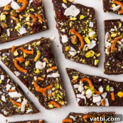 Festive Candy Treats 30 Sweet 'N' Salty Chocolate Bark, loaded with pistachios, coconut, pretzels, and dried cherries for a perfect snack.